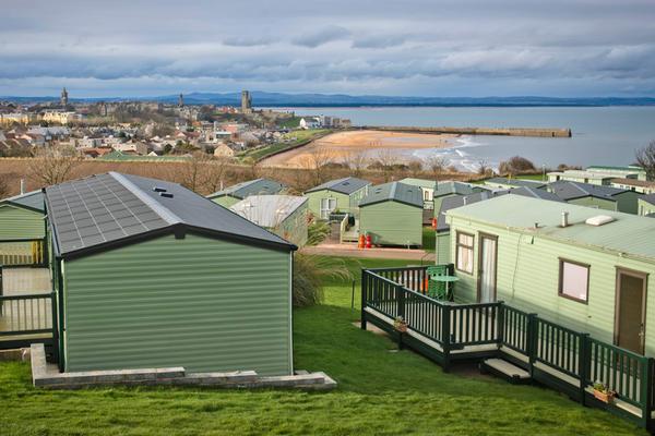 Grey skies over St Andrews Holiday Park with St Andrews beach in the distance, St Andrews